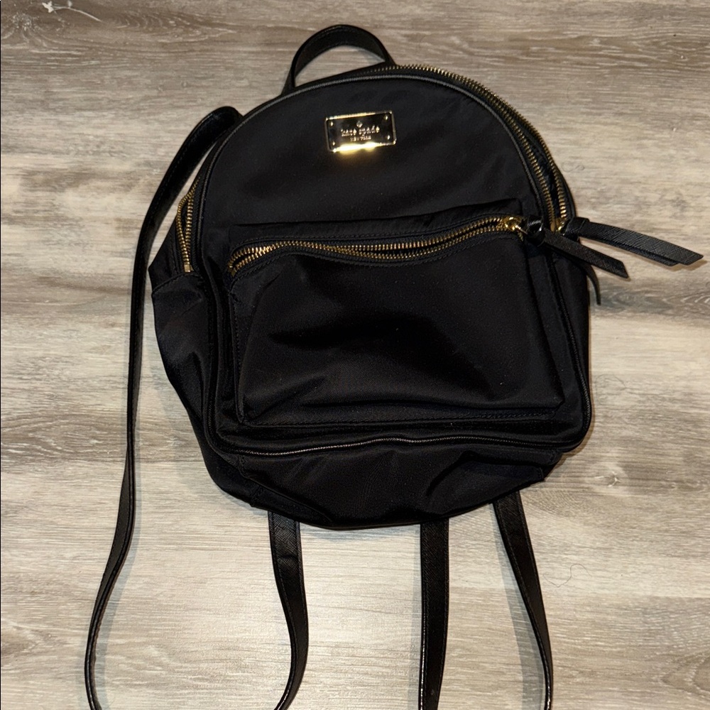 kate spade black nylon mini backpack with gold plaque and zippers